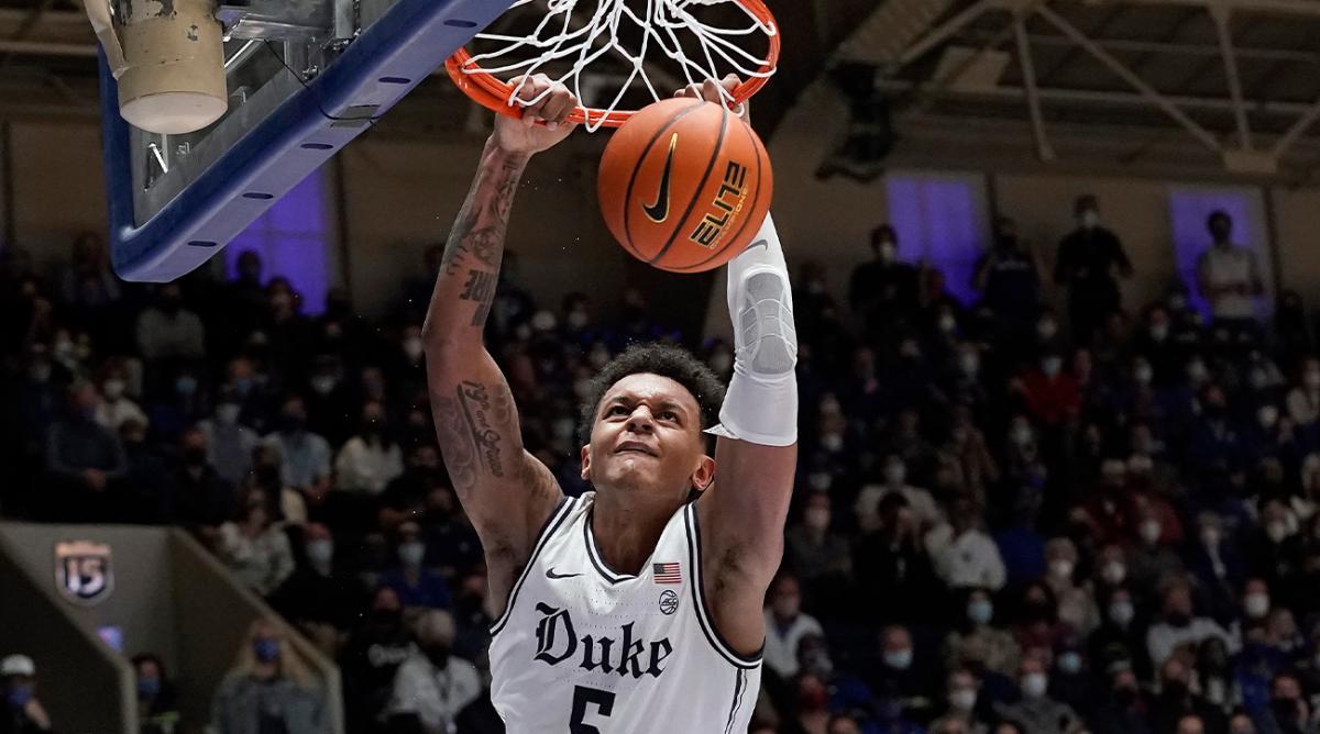Duke forward Paolo Banchero (5) dunks against North Carolina State during the second half of an NCAA college basketball game in Durham, N.C., Saturday, Jan. 15, 2022.